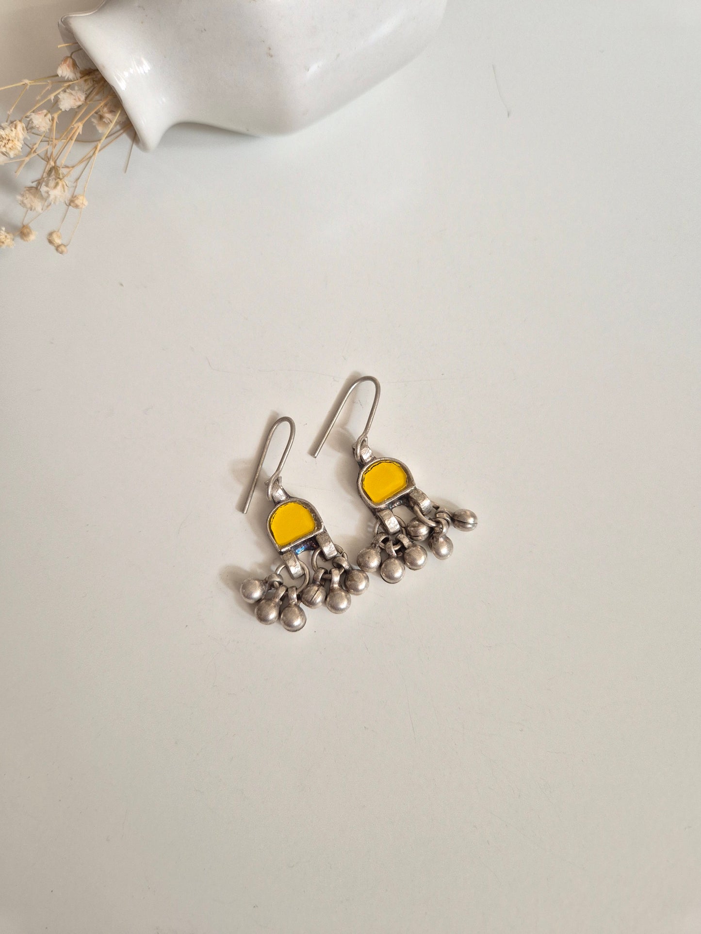 Clear and yellow glass dangle earrings, minimalist, glass detail visible