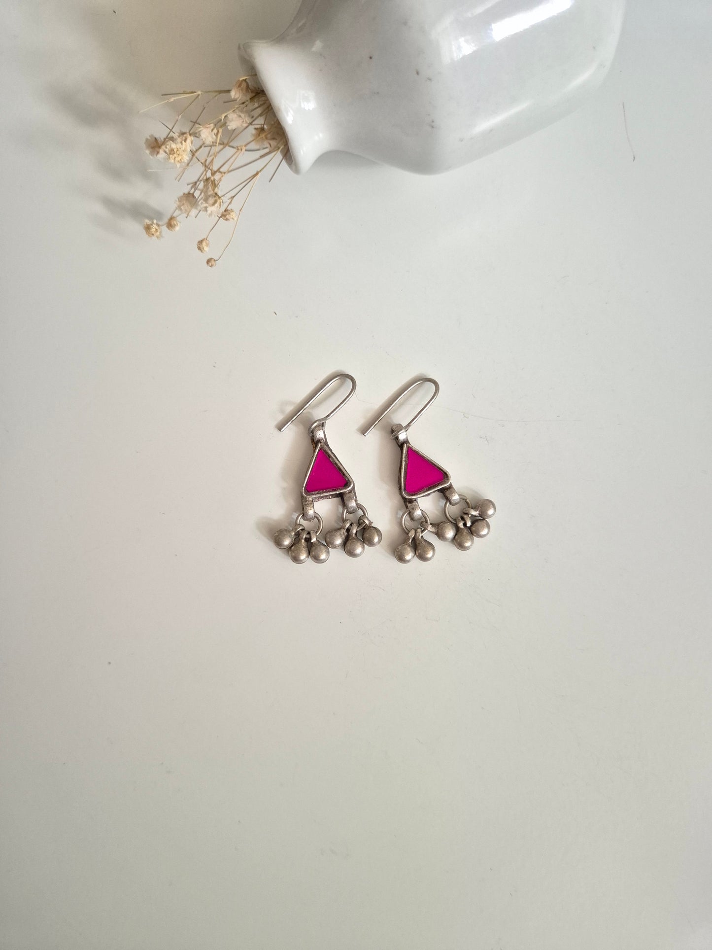Pink glass dangle earrings, close-up for color and finish