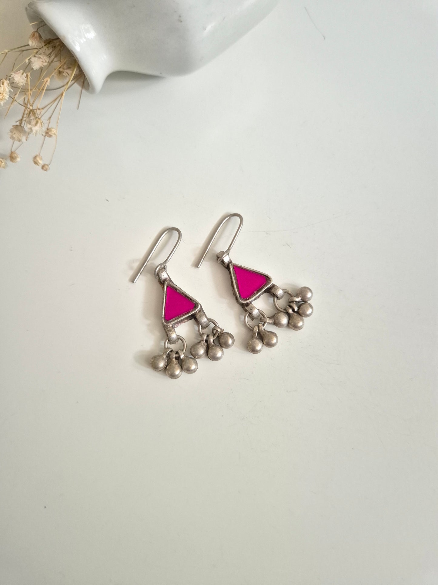 Pink glass dangle earrings, close-up for color and finish