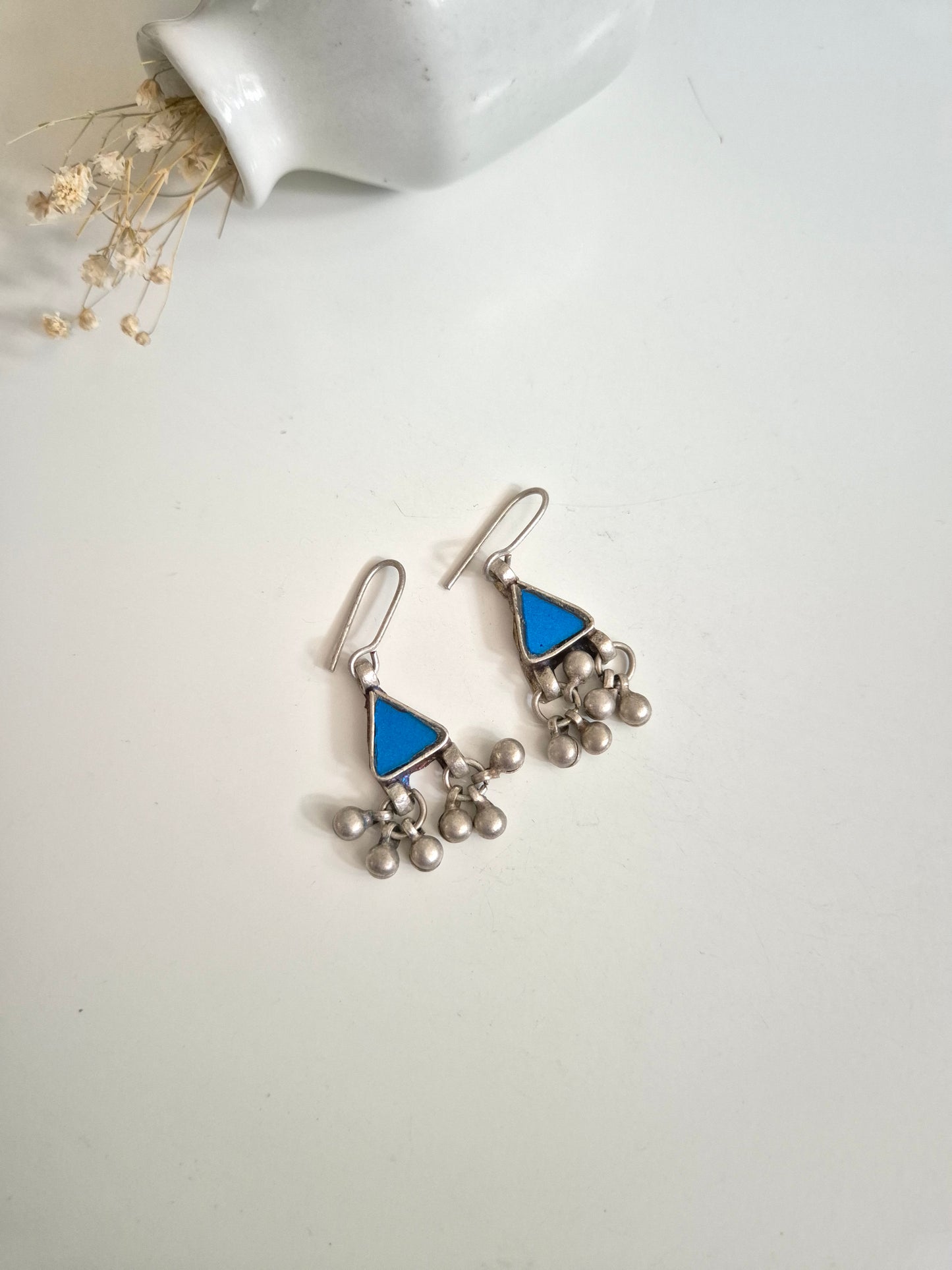 "Handcrafted blue glass earrings with dangle design, Viya Glass Earrings by Naitri.",