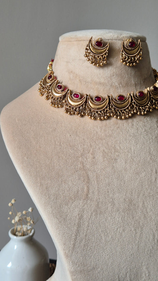 Golden necklace set, Girija by Naitri, simple design on white.