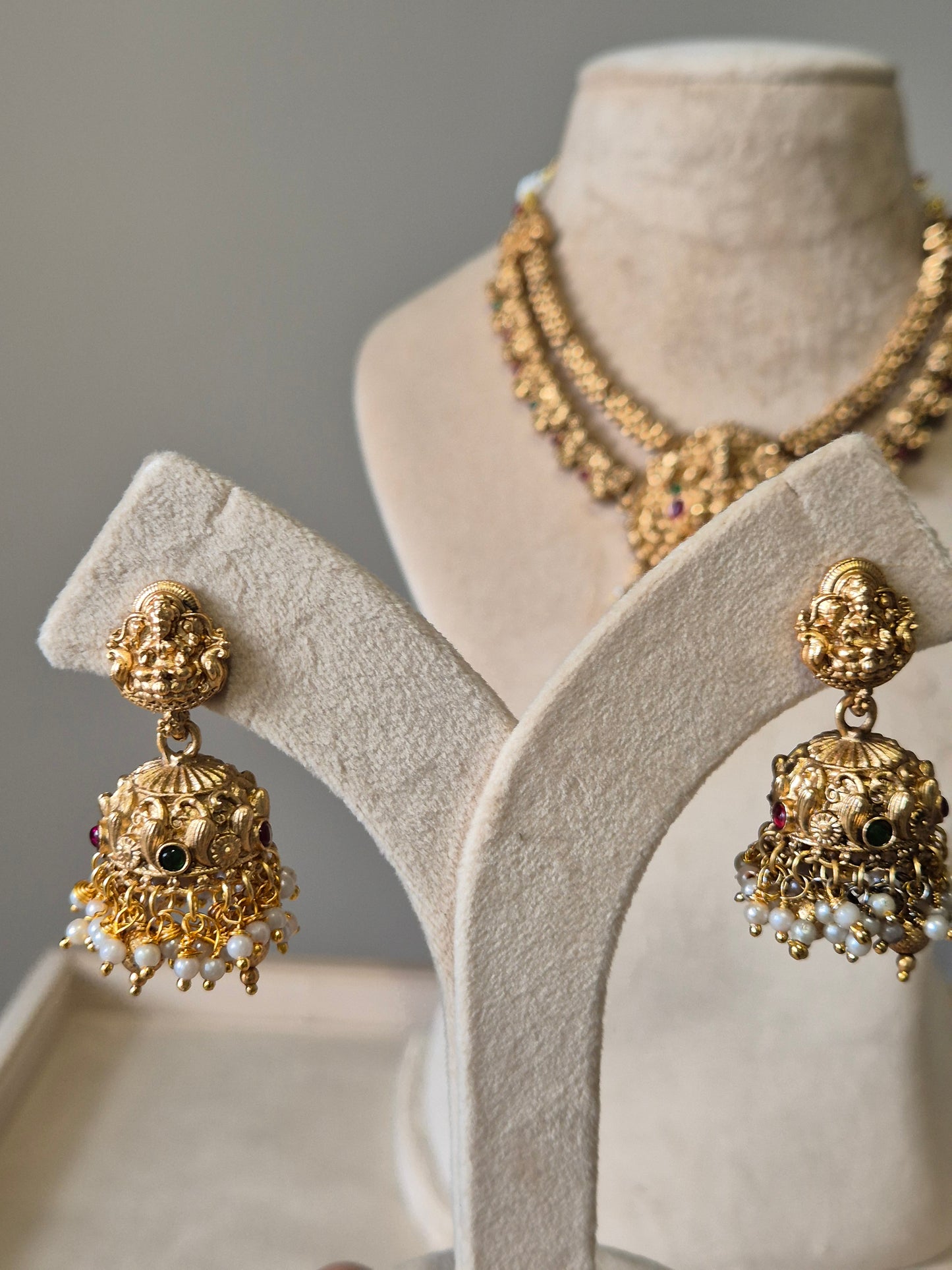 Gold necklace set, Aruna by Naitri, premium festive jewelry on white background.