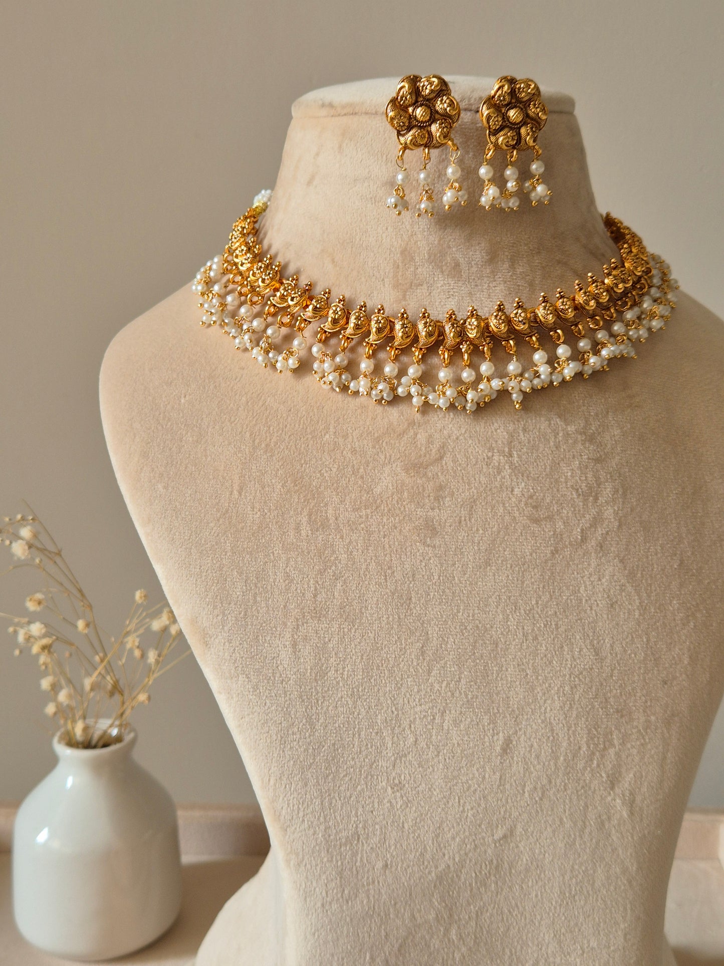Gold necklace set, Rini by Naitri, traditional design with temple motifs.