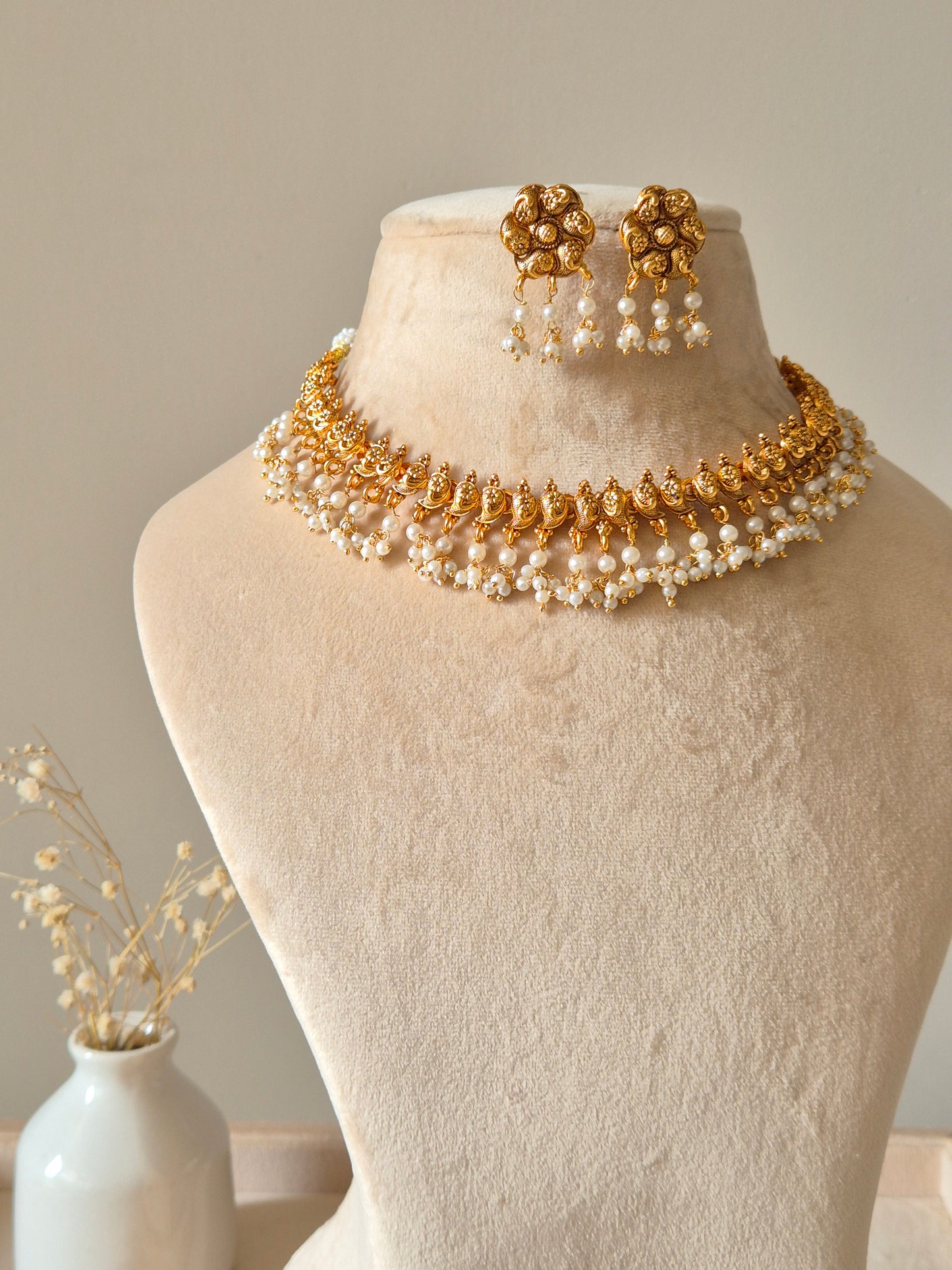 Gold necklace set, Rini by Naitri, traditional design with temple motifs.