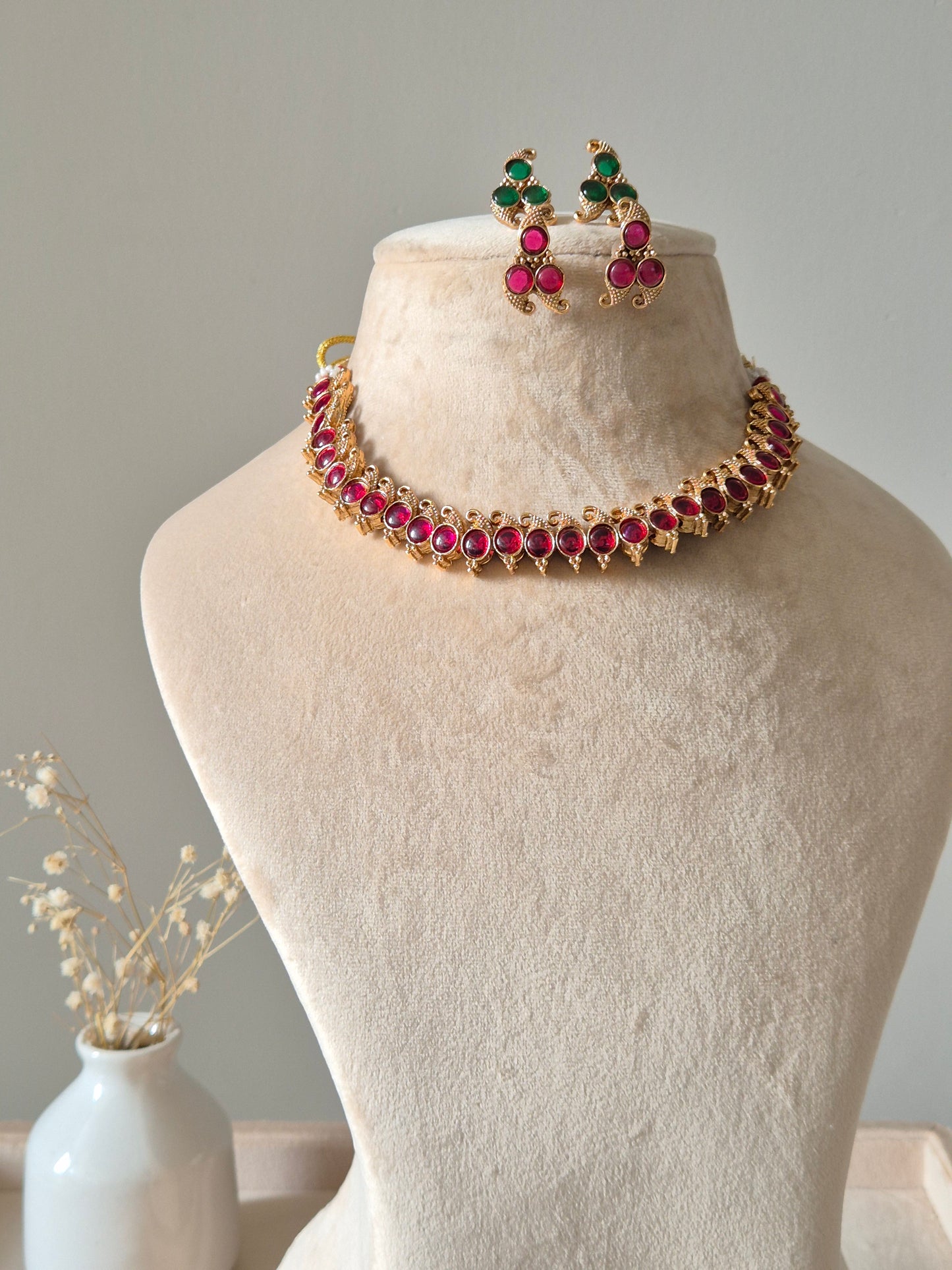 Reversible gold pendant necklace set, Kavi by Naitri, with stud earrings.