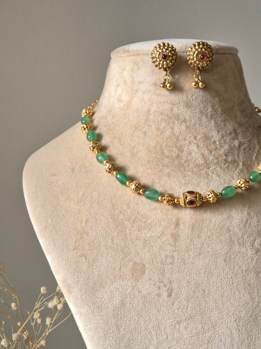 Green and gold statement necklace set with matching earrings, Ishira by Naitri.