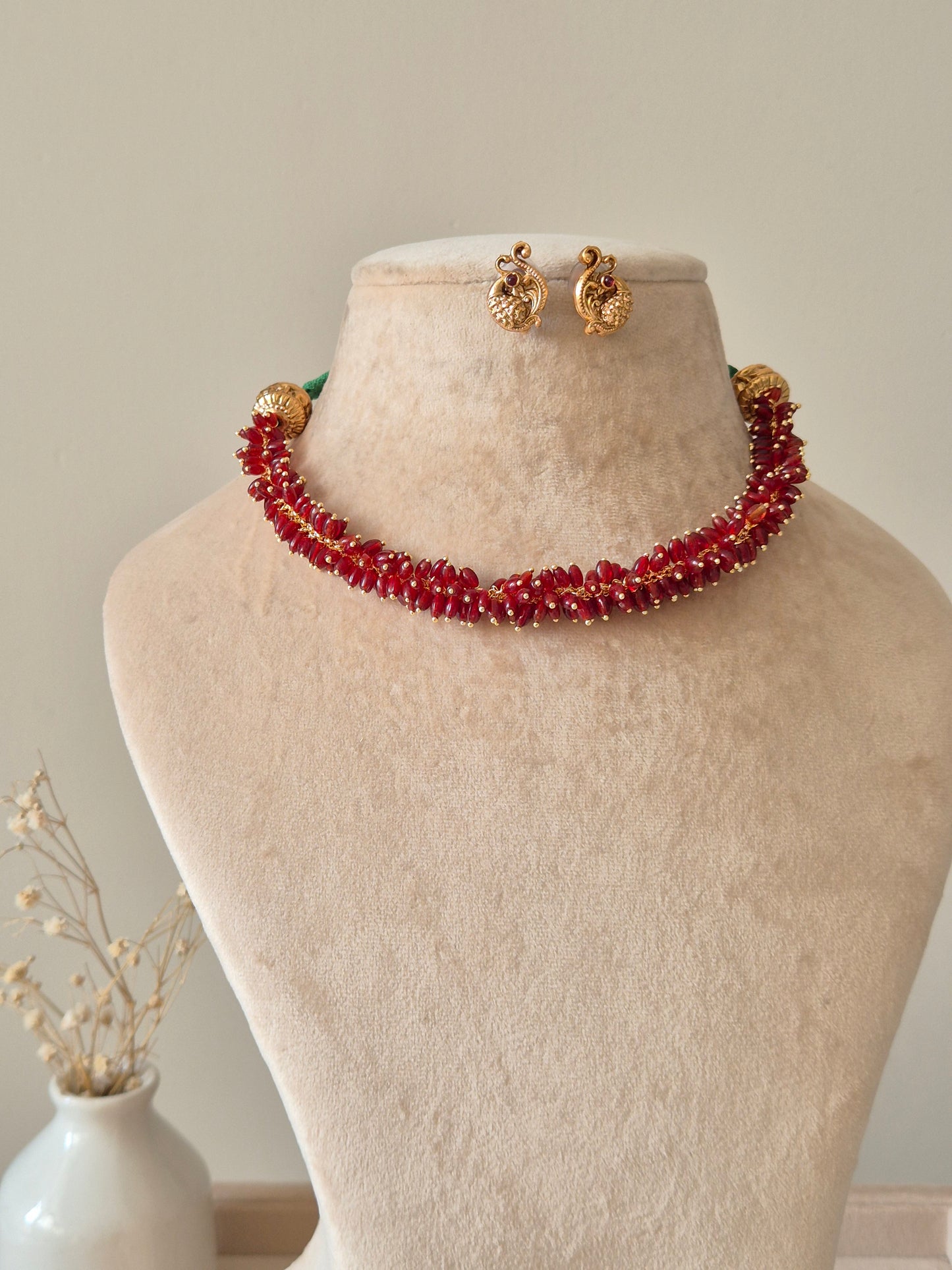 Gold and red choker necklace set, Sneha by Naitri, classic festive design.