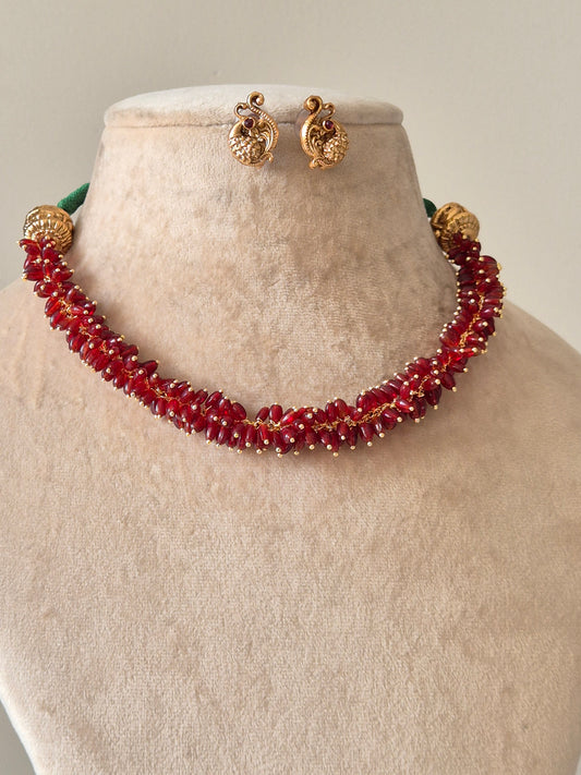 Gold and red choker necklace set, Sneha by Naitri, classic festive design.