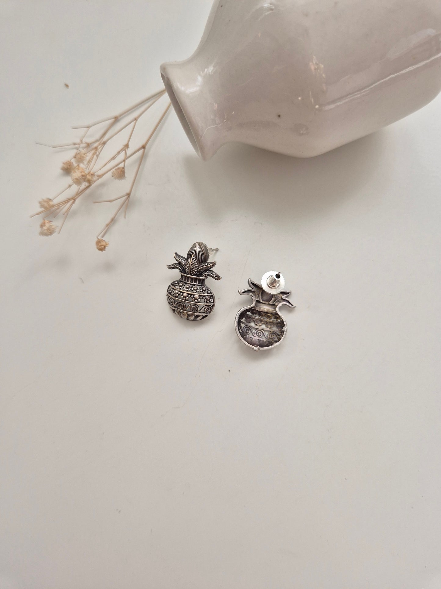 Naimisha Earrings, silver handcrafted oxidized stud earrings, unique handmade accessory.