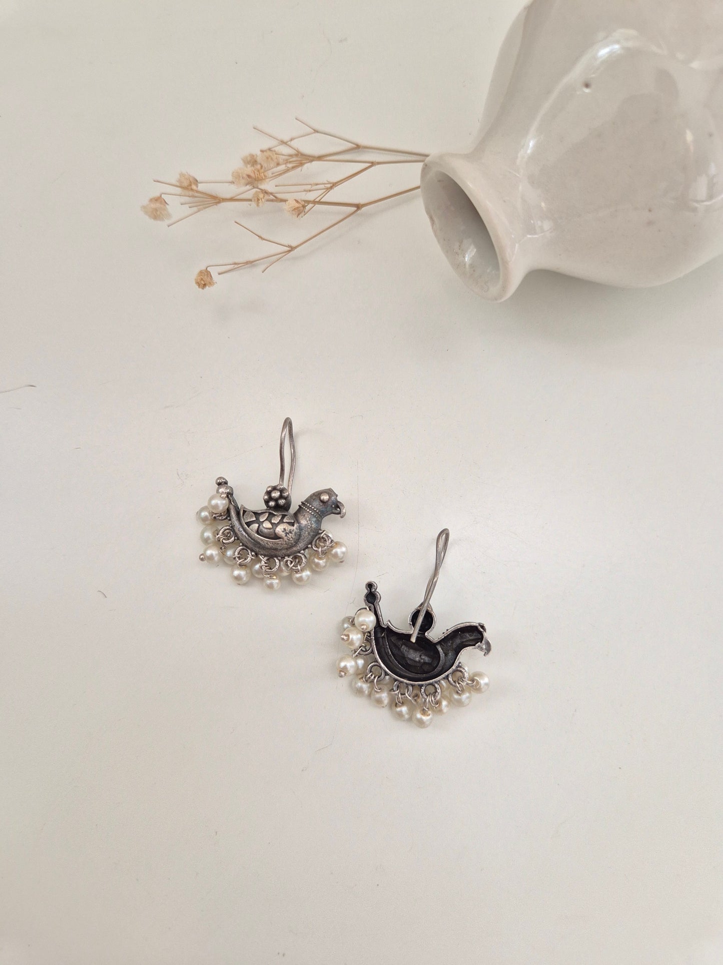 Suveera Earrings, handcrafted oxidized earrings with unique bird design, charming and lightweight.