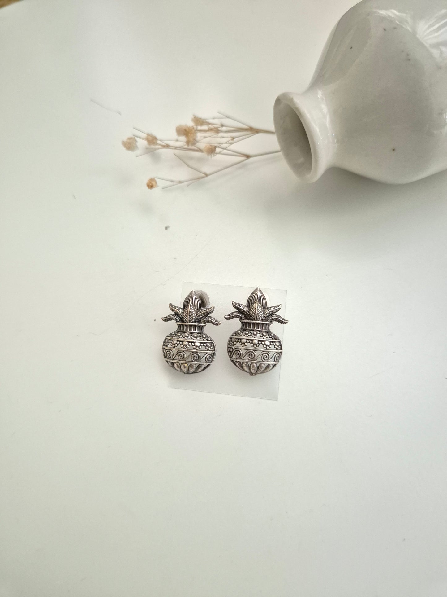 Naimisha Earrings, silver handcrafted oxidized stud earrings, unique handmade accessory.