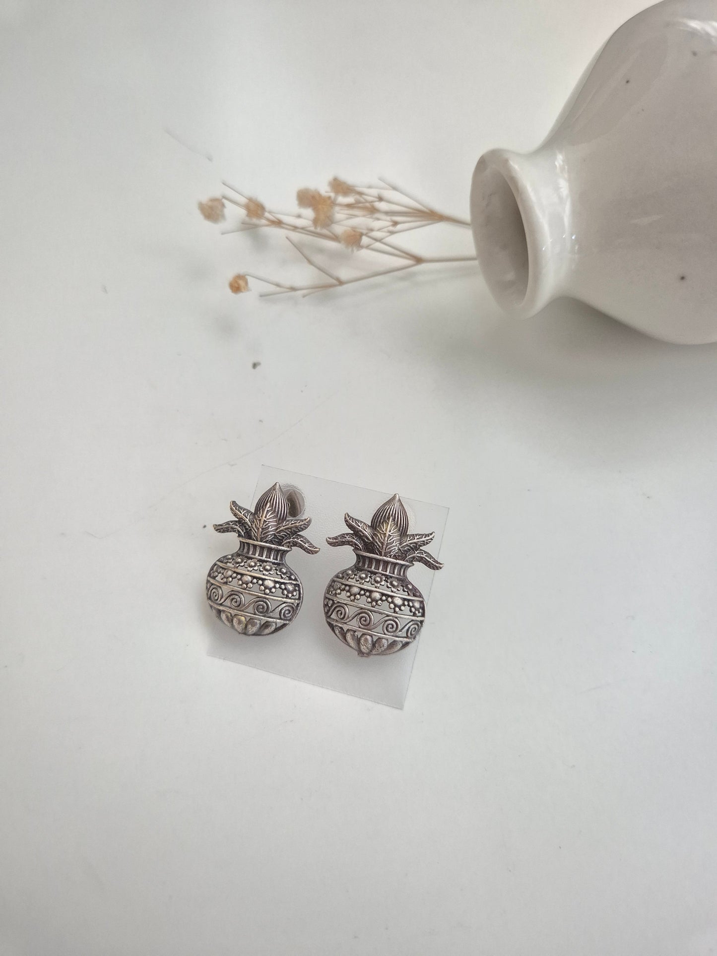 Naimisha Earrings, silver handcrafted oxidized stud earrings, unique handmade accessory.