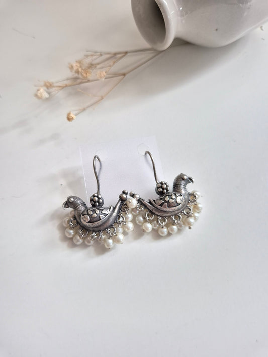 Suveera Earrings, handcrafted oxidized earrings with unique bird design, charming and lightweight.