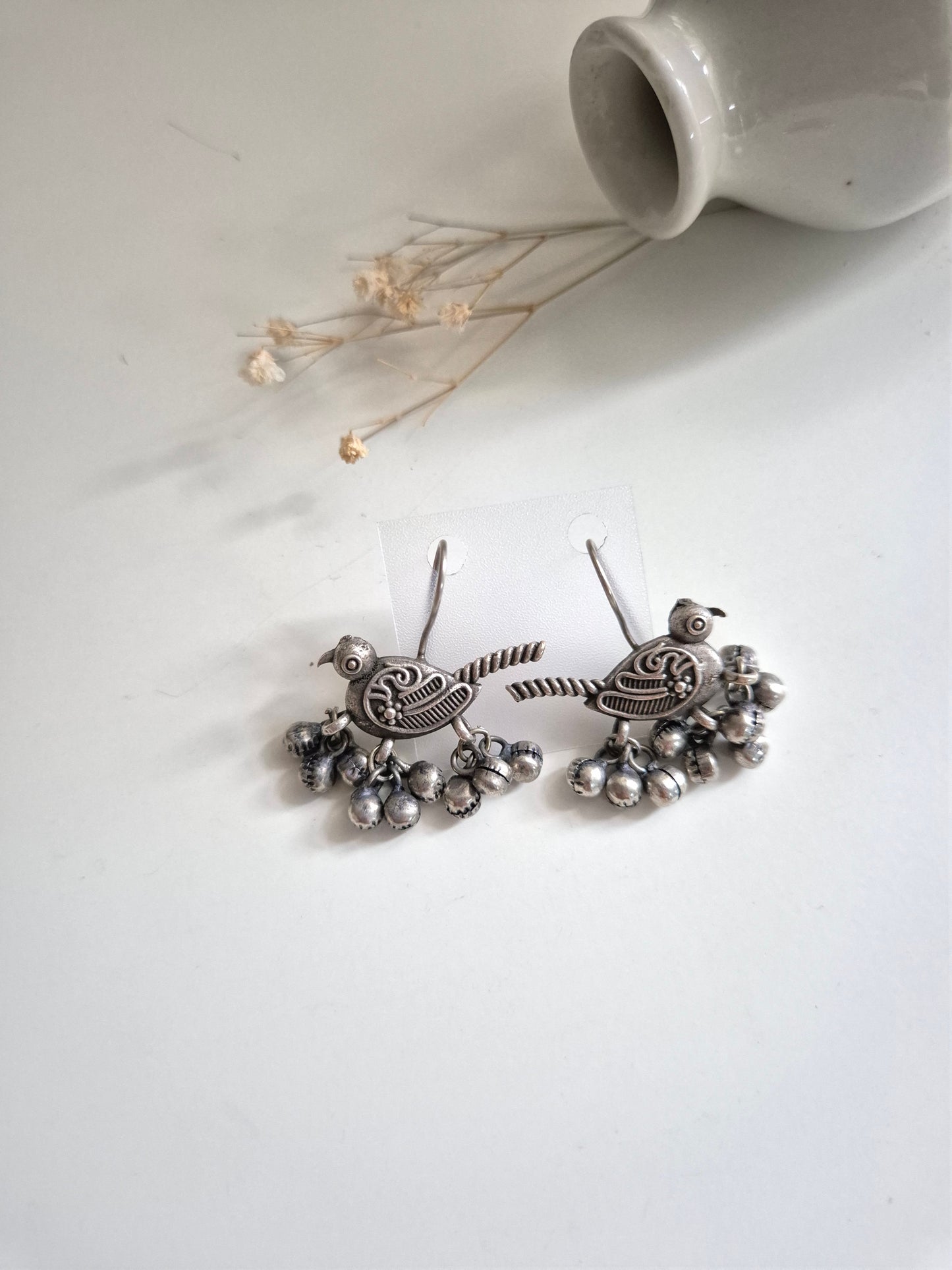 Hridaani Earrings, unique bird design handcrafted oxidized dangle earrings, artistic statement.