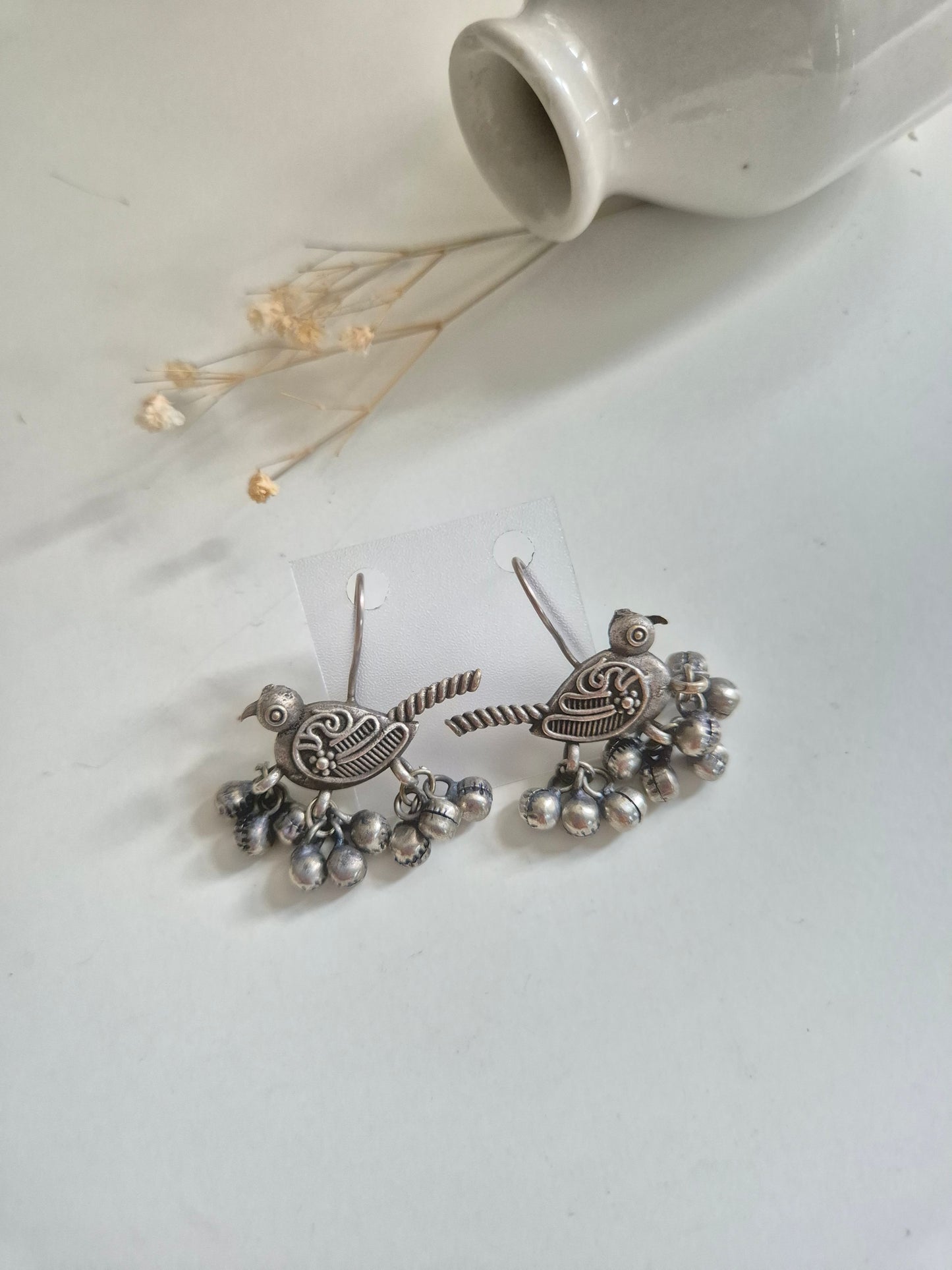 Hridaani Earrings, unique bird design handcrafted oxidized dangle earrings, artistic statement.