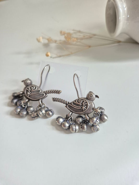 Hridaani Earrings, unique bird design handcrafted oxidized dangle earrings, artistic statement.