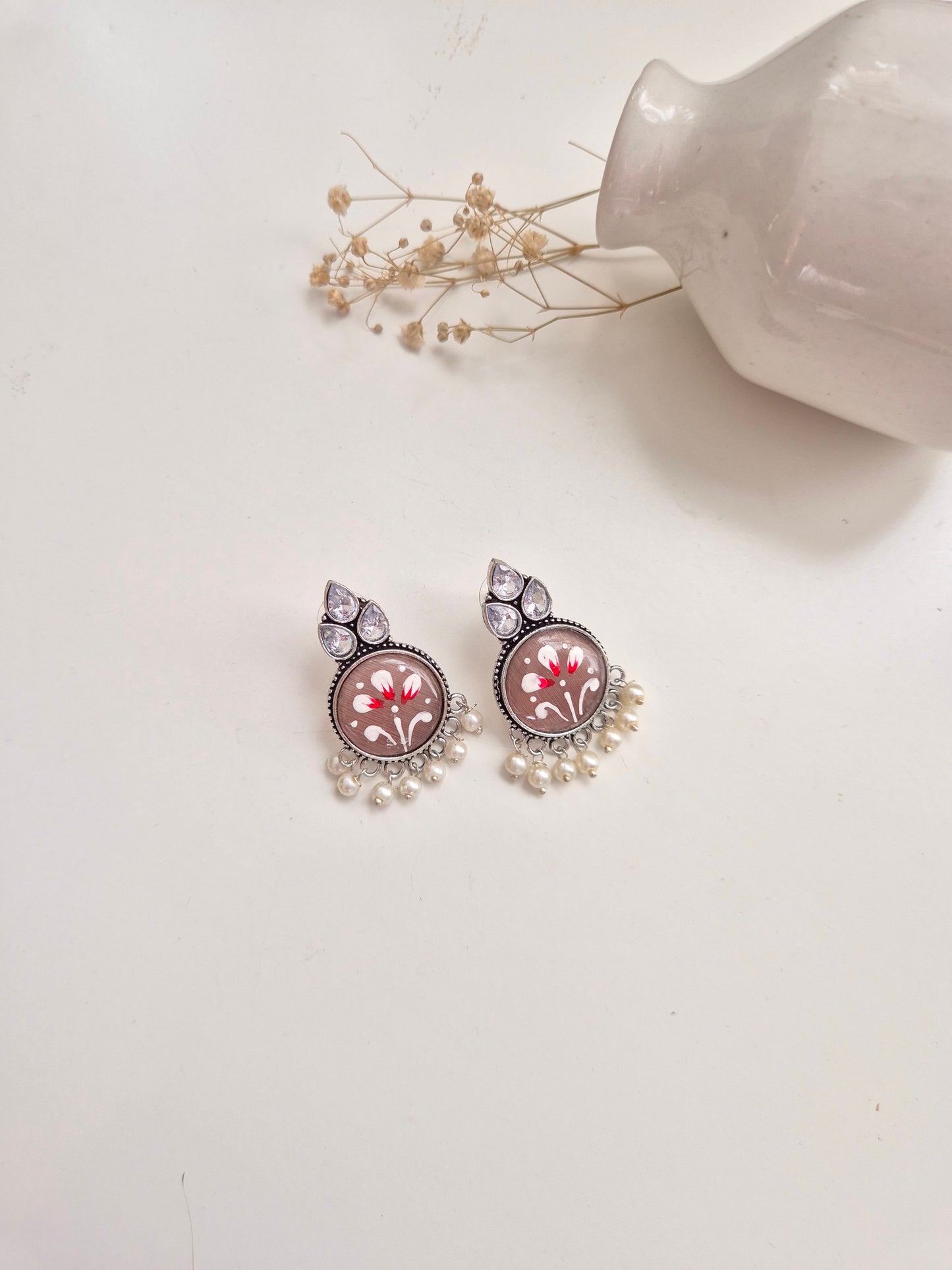 Jayanti Earrings, premium handcrafted oxidized red and silver jewelry, stylish and refined.