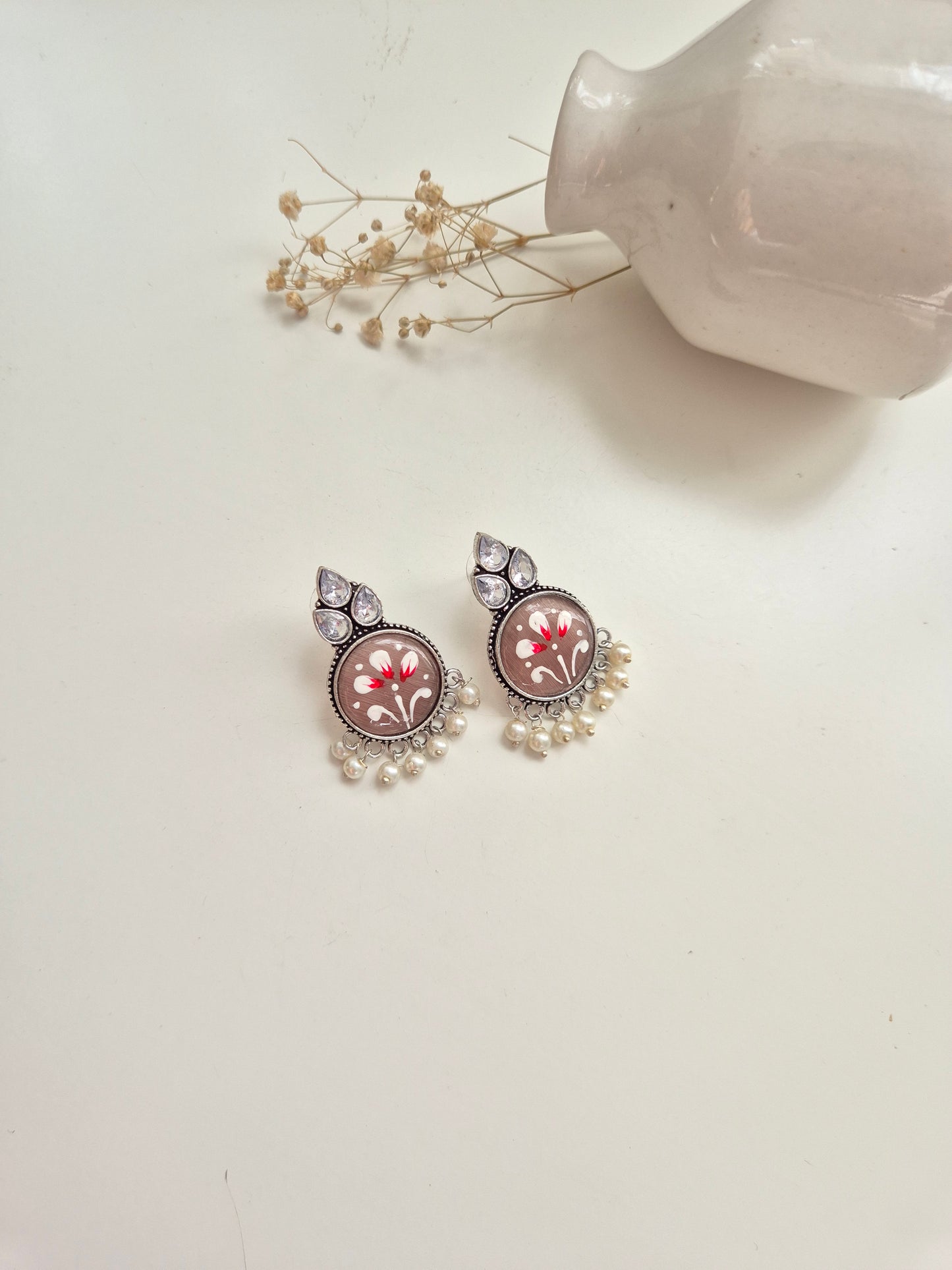 Jayanti Earrings, premium handcrafted oxidized red and silver jewelry, stylish and refined.