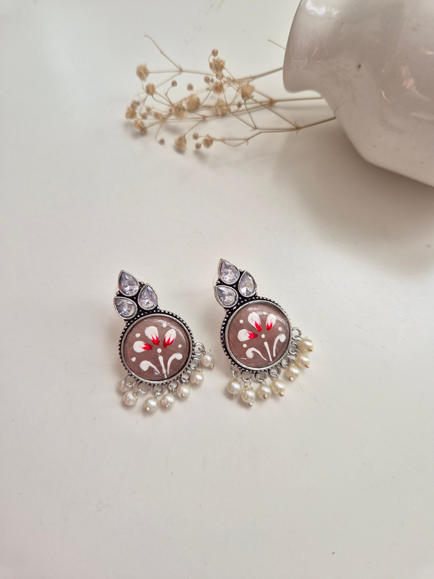 Jayanti Earrings, premium handcrafted oxidized red and silver jewelry, stylish and refined.