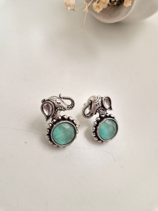 Handcrafted oxidized Kiara Earrings with silver and green accents, perfect for festive or casual.