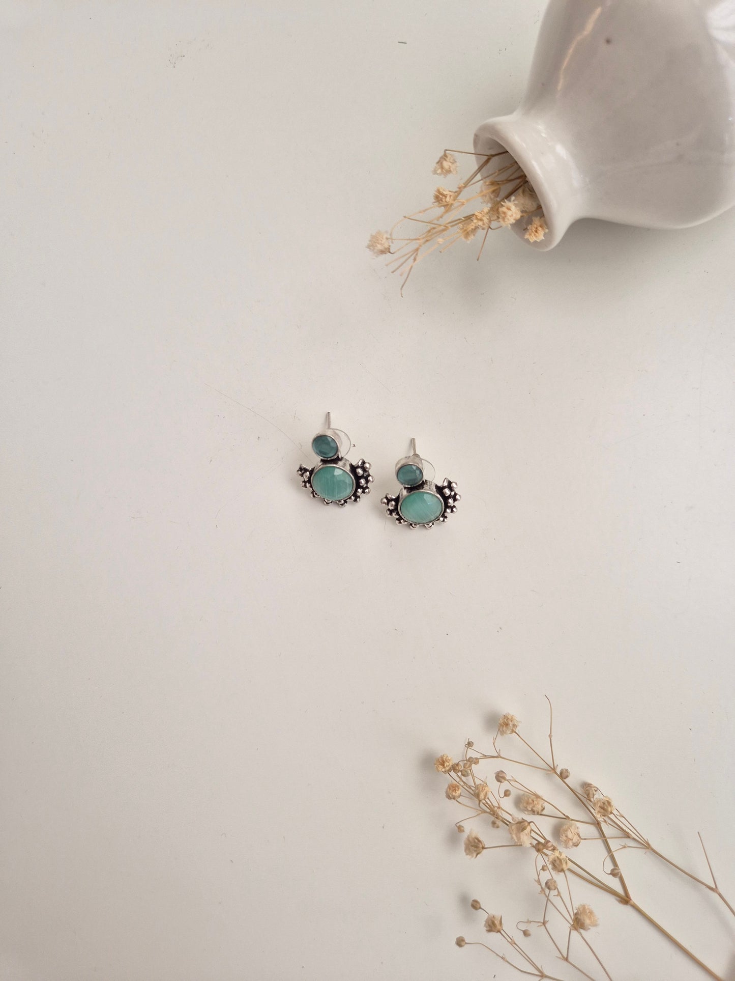 Pallavi Earrings, handcrafted oxidized jewelry with silver and green dangle, versatile and bold.