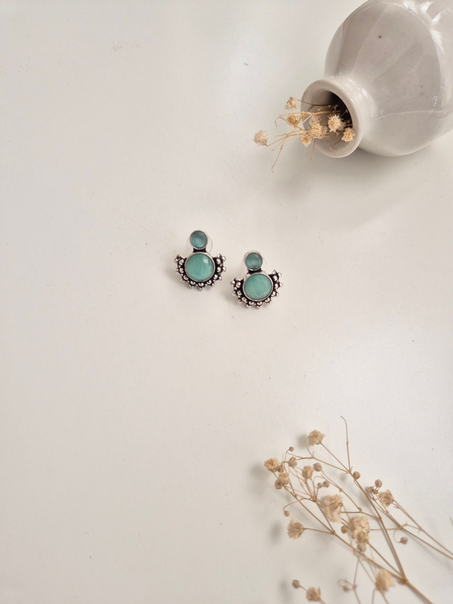 Pallavi Earrings, handcrafted oxidized jewelry with silver and green dangle, versatile and bold.