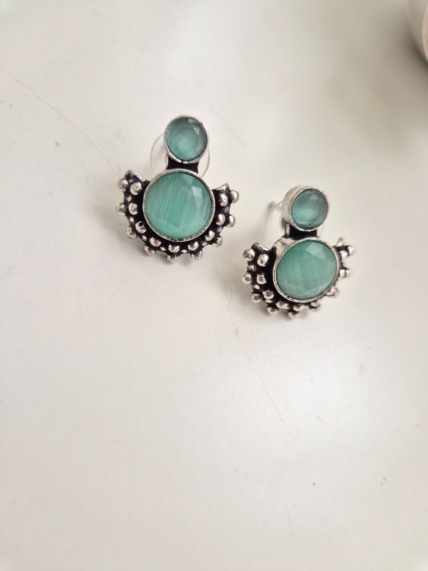 Pallavi Earrings, handcrafted oxidized jewelry with silver and green dangle, versatile and bold.