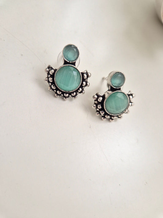 Pallavi Earrings, handcrafted oxidized jewelry with silver and green dangle, versatile and bold.