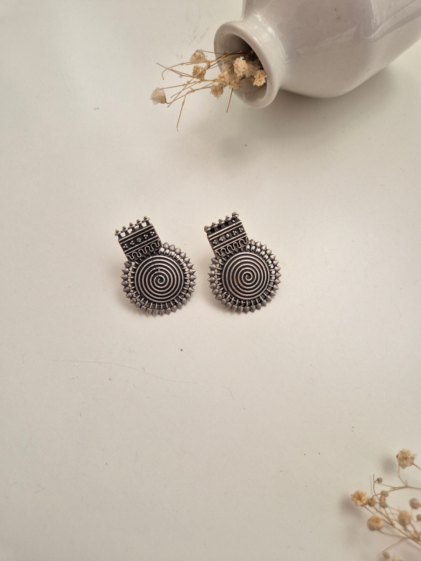 Elegant handcrafted oxidized Nishka Earrings in silver dangle design for stylish everyday wear.