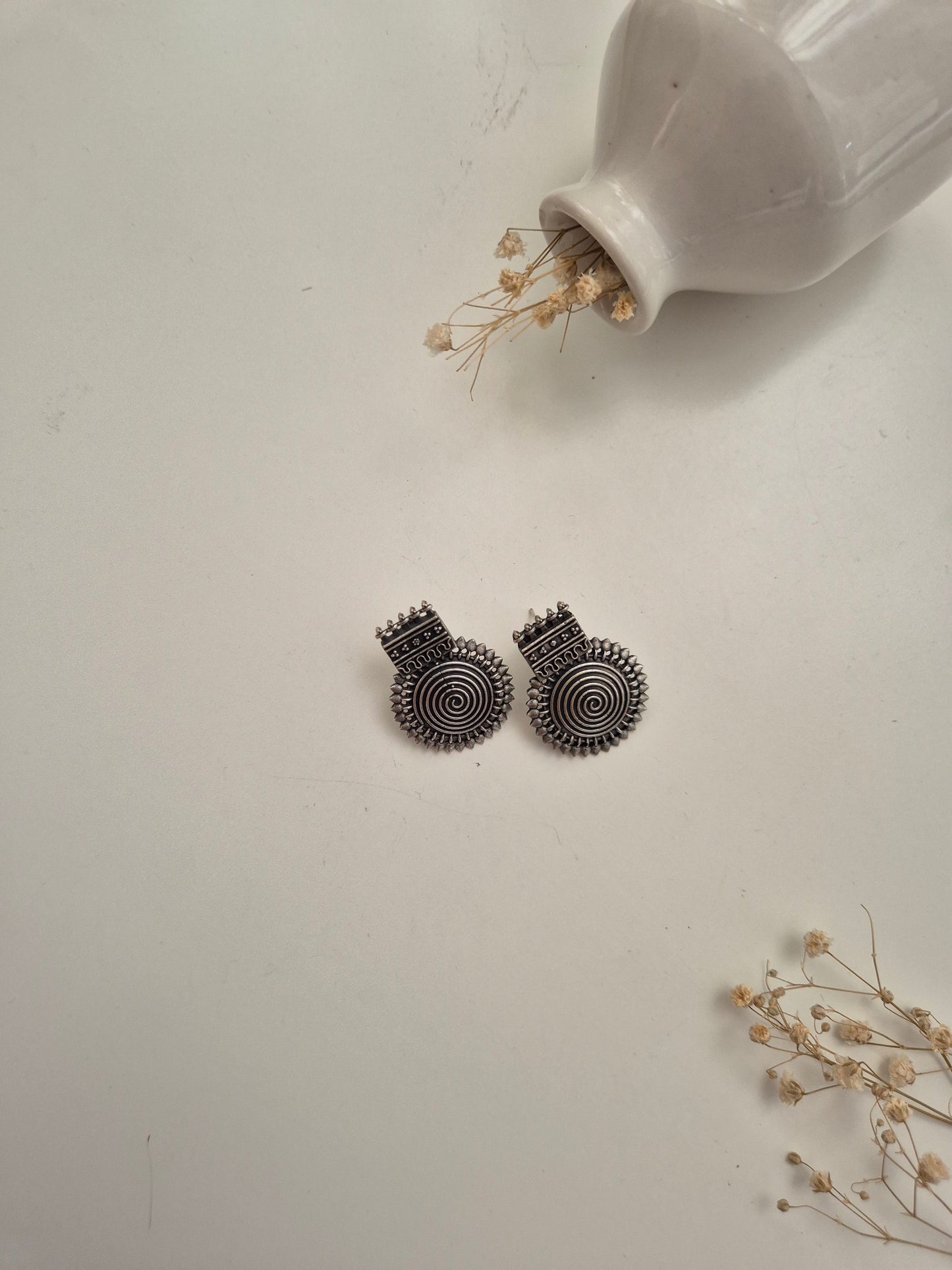 Elegant handcrafted oxidized Nishka Earrings in silver dangle design for stylish everyday wear.