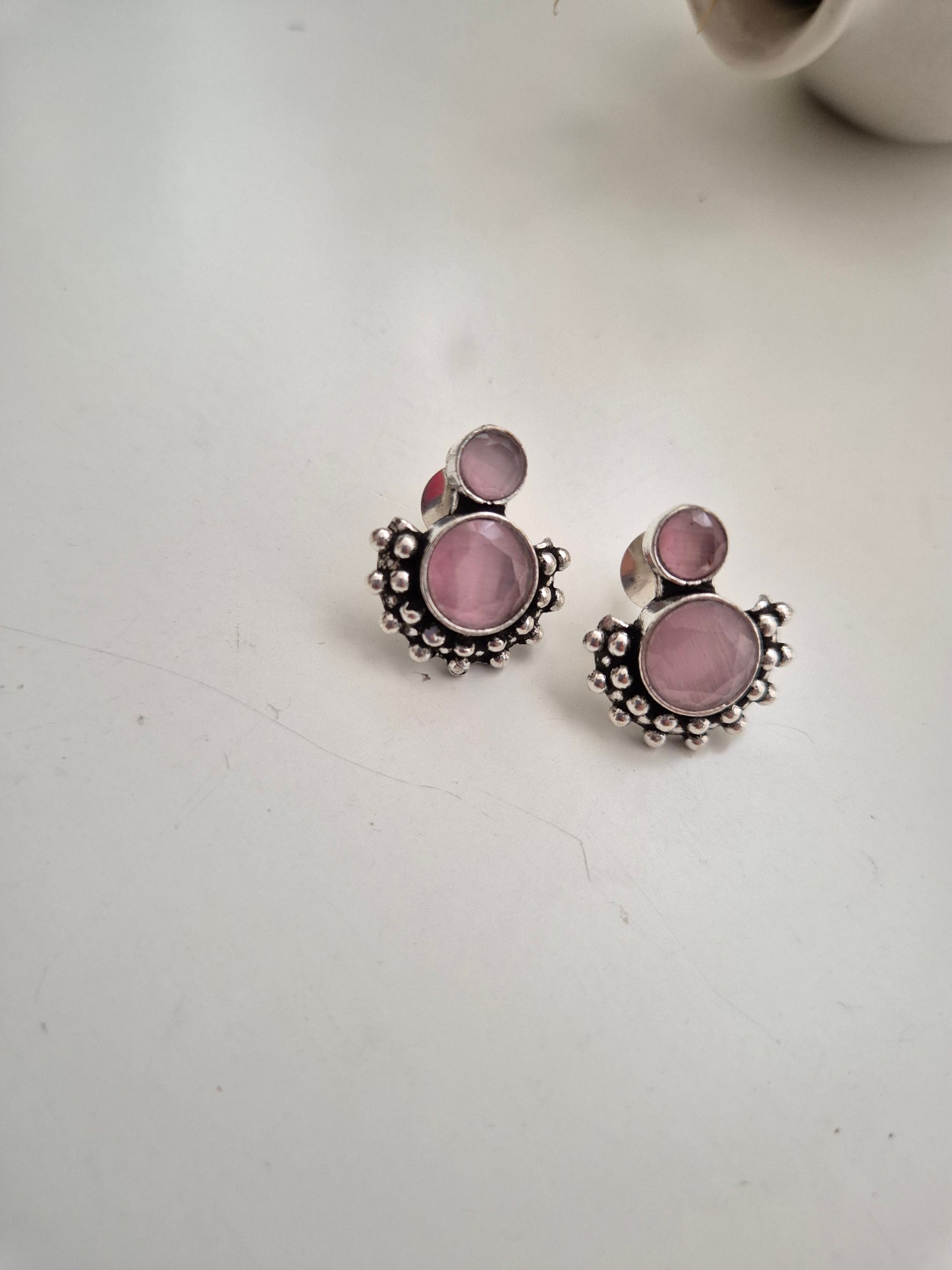 Elegant handcrafted oxidized Jivika Earrings in pink stud style, lightweight comfort.