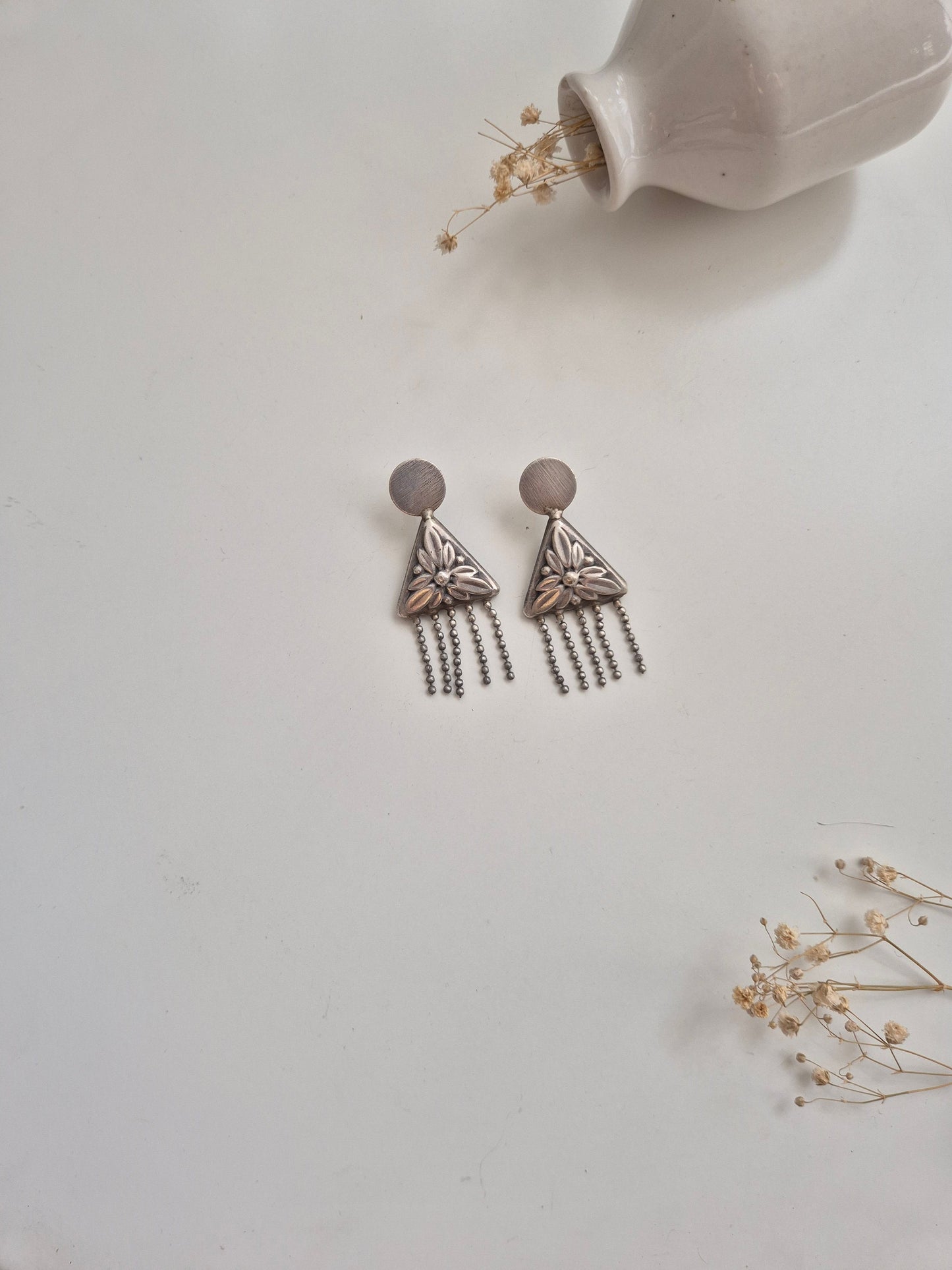 Advika Earrings by Naitri, handcrafted oxidized silver jewelry for versatile styling.