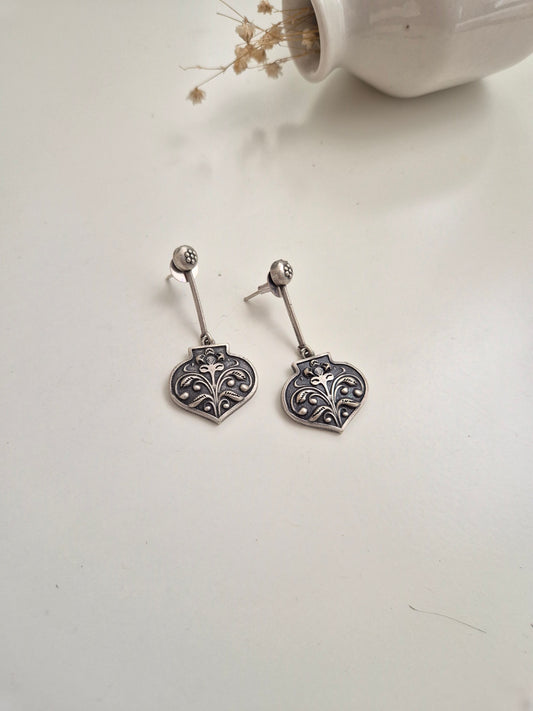 Silver look oxidized Ayati Earrings with dangle, drop, and stud styles, elegant and versatile.