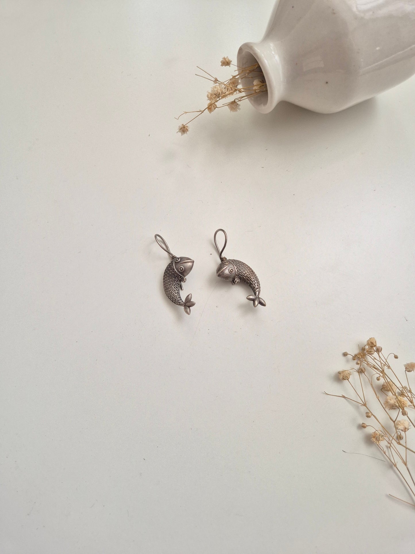 Handcrafted oxidized Hansika Earrings, lightweight silver drop style for women.