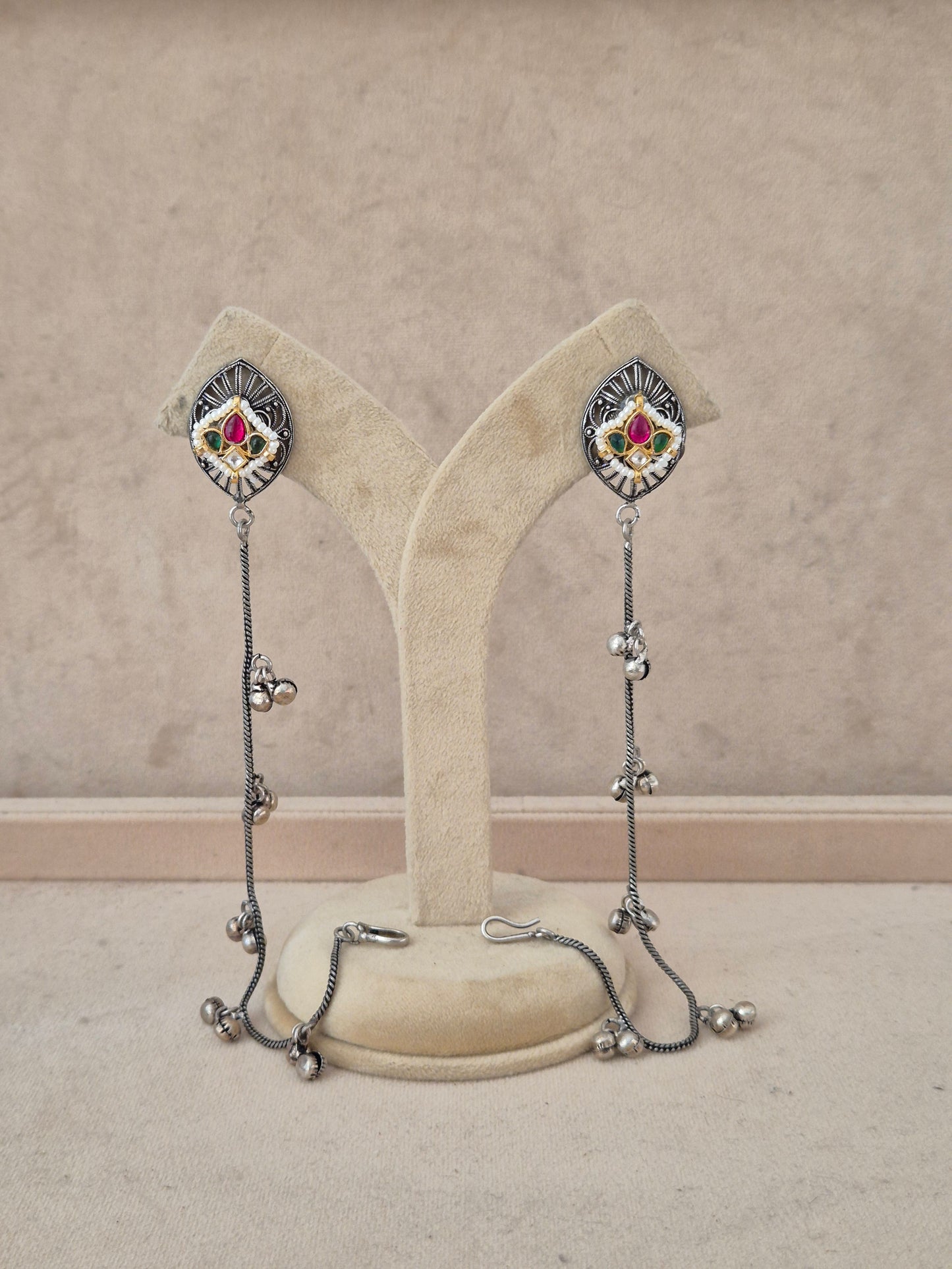Naitri Anokhi Earrings handcrafted in oxidized silver alloy with vibrant stone work and tassel details
