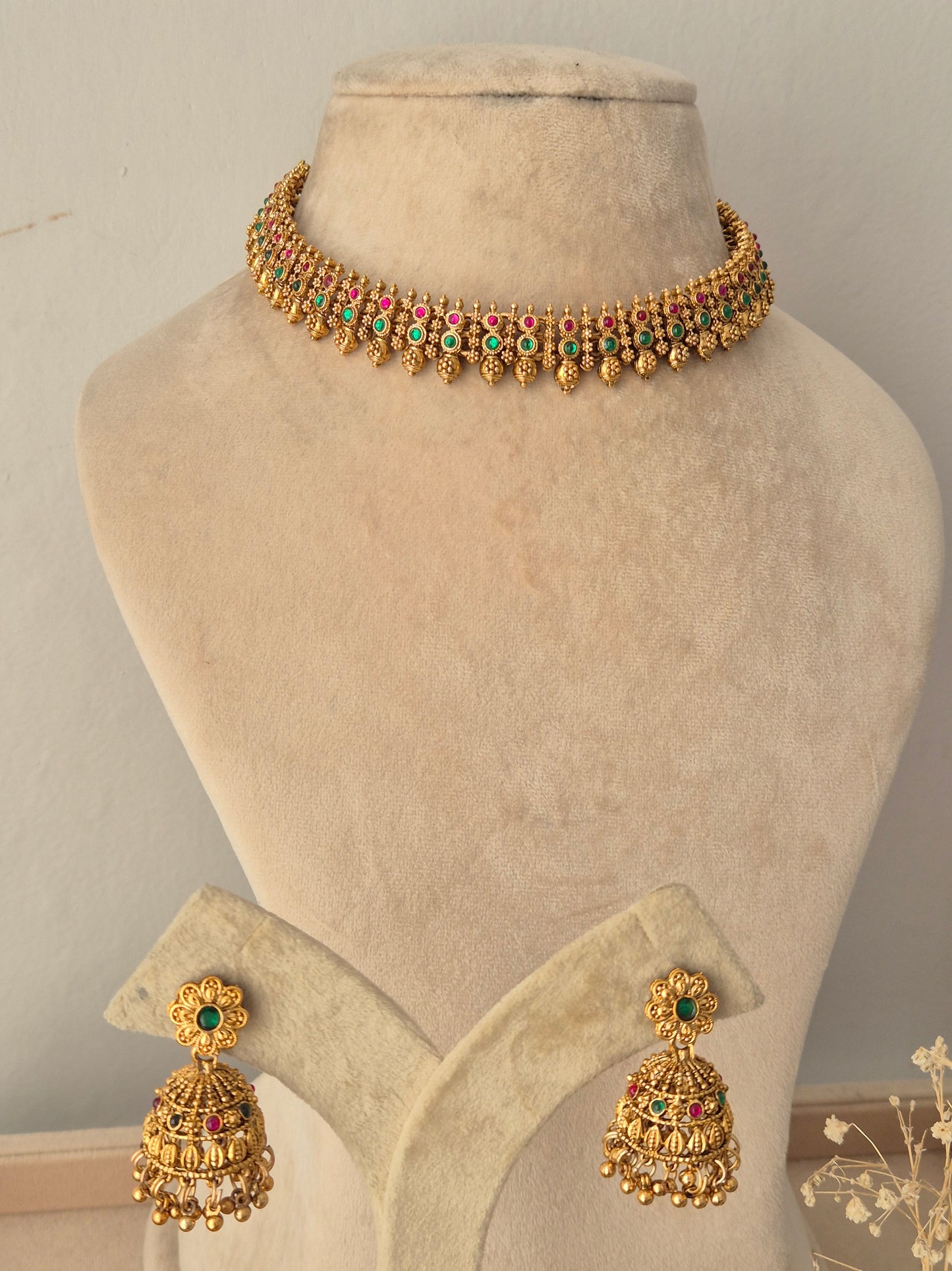Alpana Choker Necklace Set antique gold temple jewelry choker with pink green stones and matching jhumka earrings by Naitri