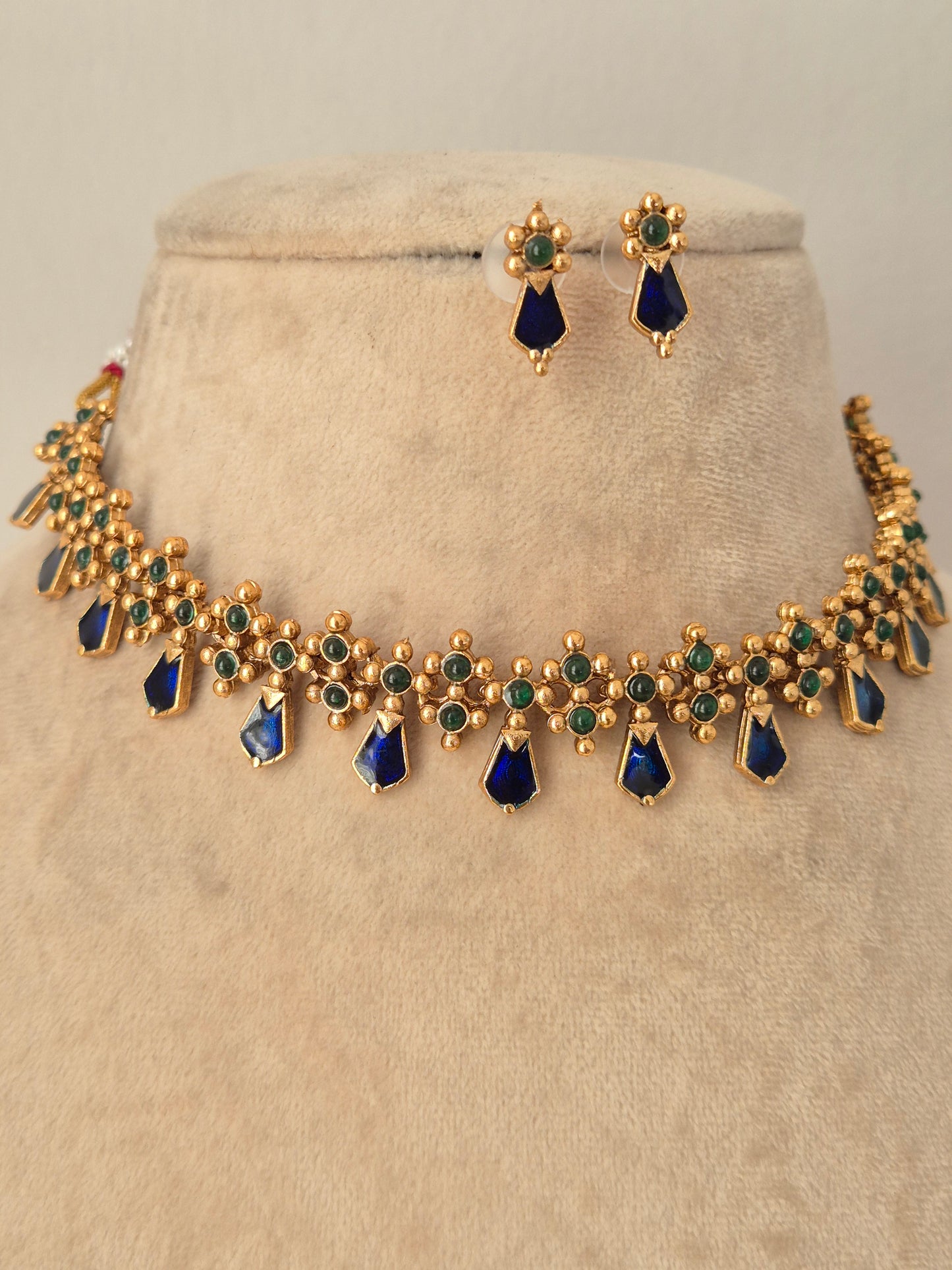 Ehsaas Necklace Set gold choker with green stones and pearl drops by Naitri