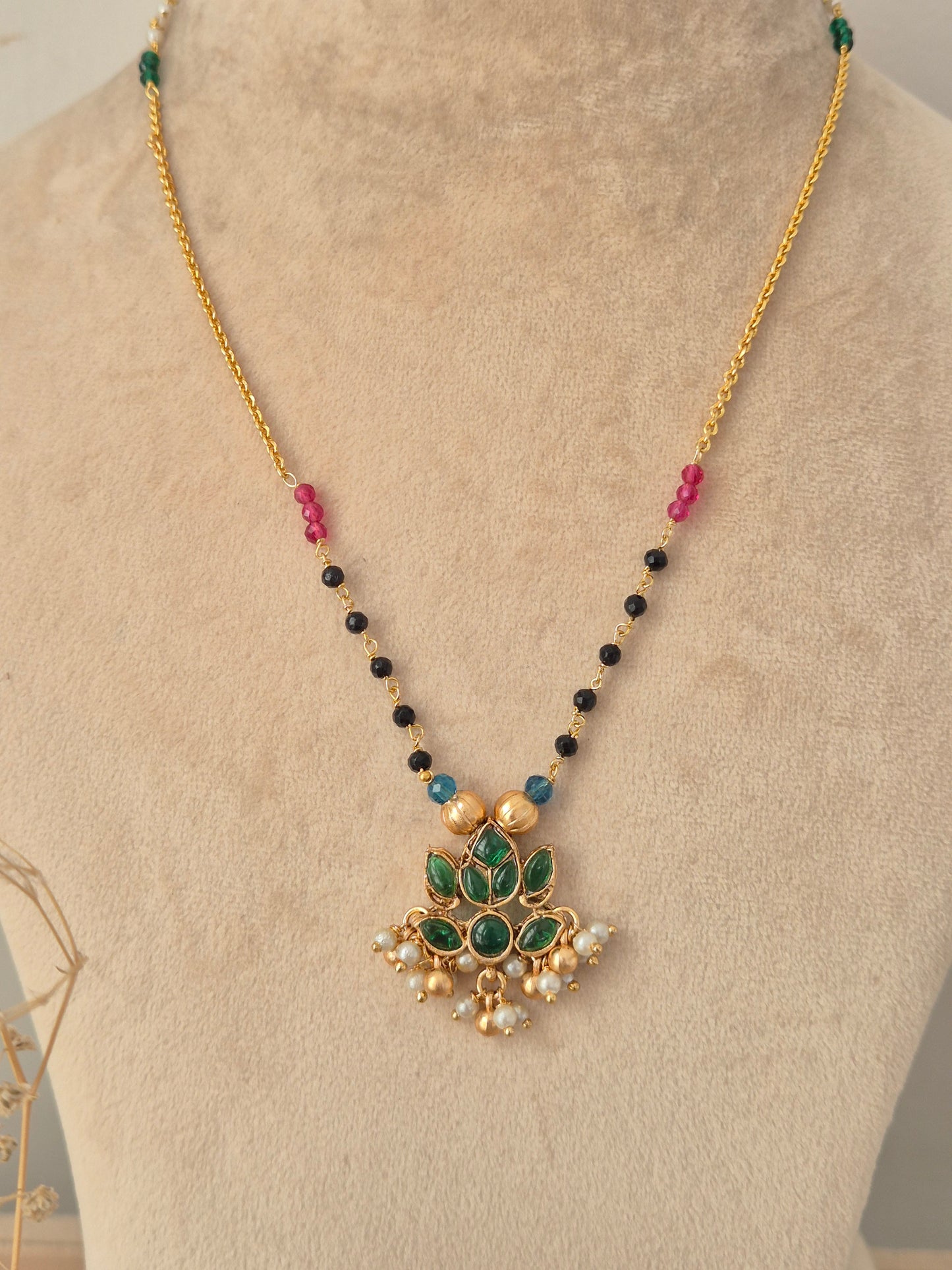 Prabhati Necklace Set gold chain with green stone lotus pendant and matching stud earrings by Naitri