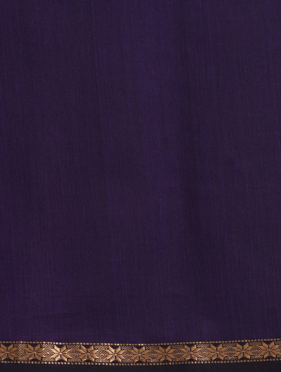 Bright cobalt blue and purple saree draped neatly to highlight delicate handwoven pattern and fabric texture