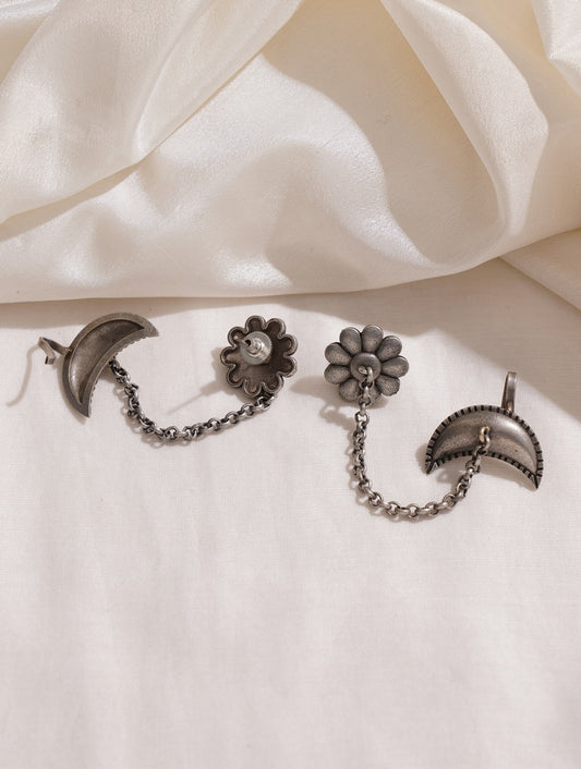 Silver floral dangle earrings, handcrafted detail, elegant look