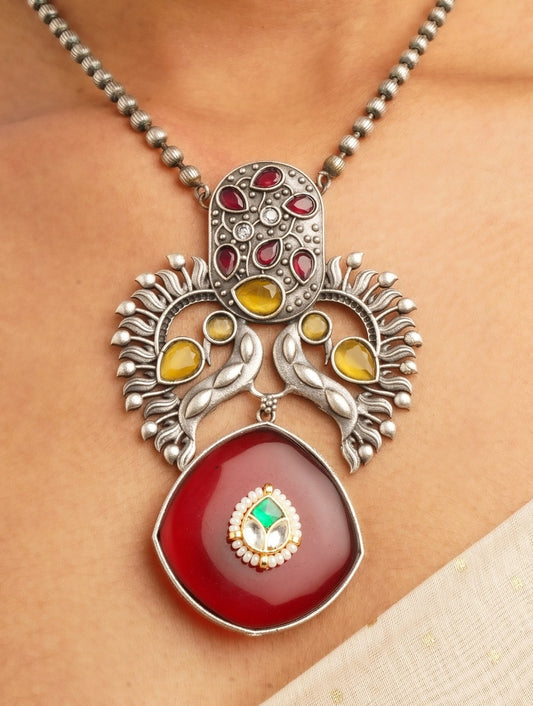 Yellow and red pendant necklace set, Noorika by Naitri, statement design displayed.
