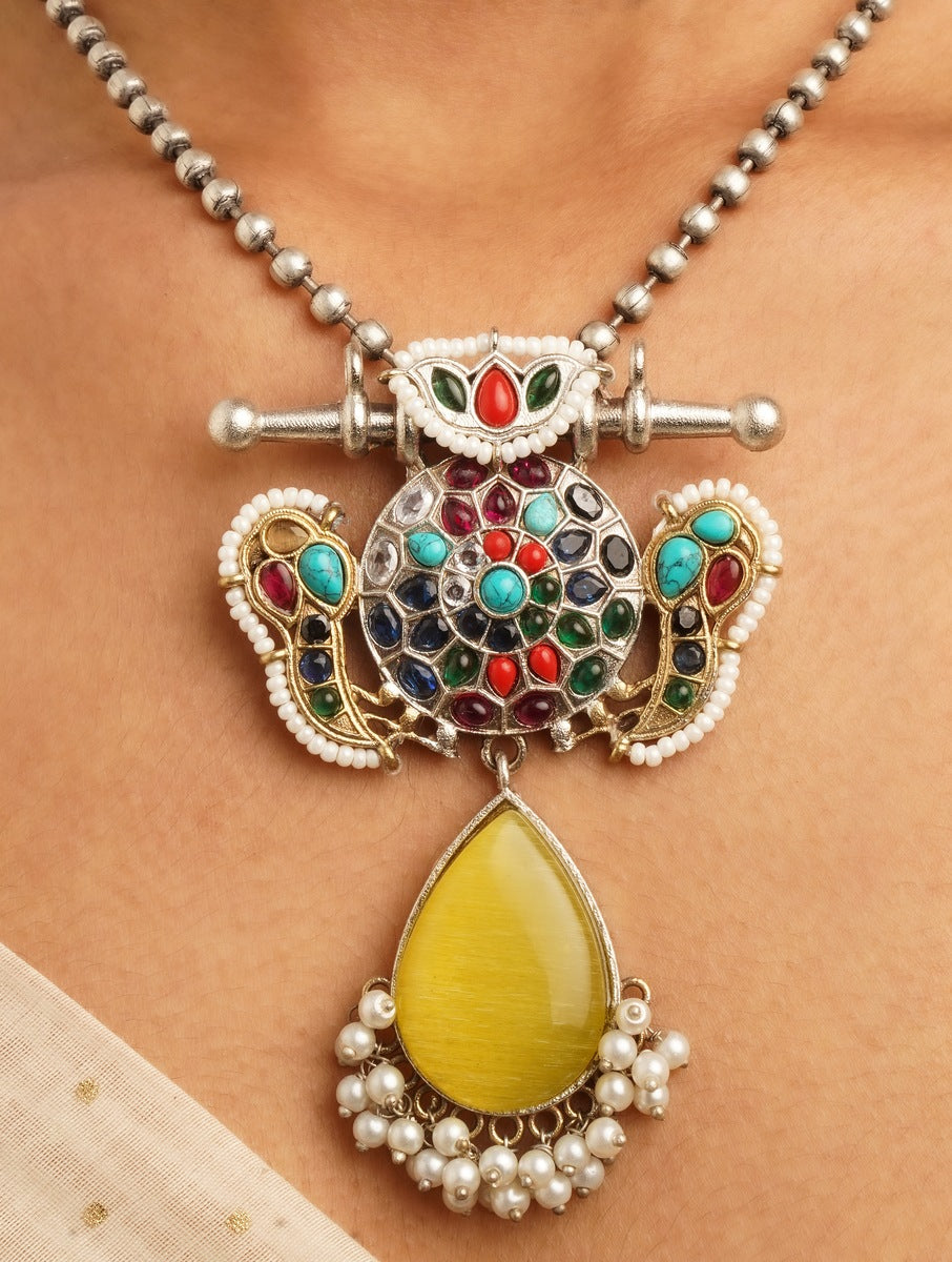 Orange stone pendant necklace set, Taru by Naitri, shown with matching earrings.