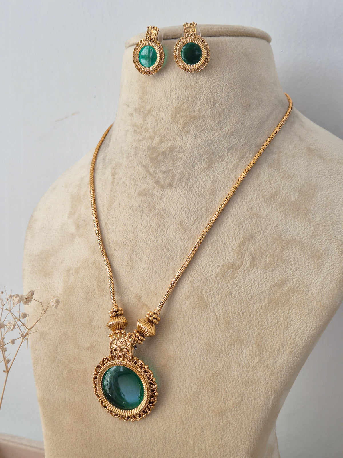 Bhavana Necklace Set - Antique gold-toned ethnic pendant necklace and matching stud earrings collection by Naitri.in