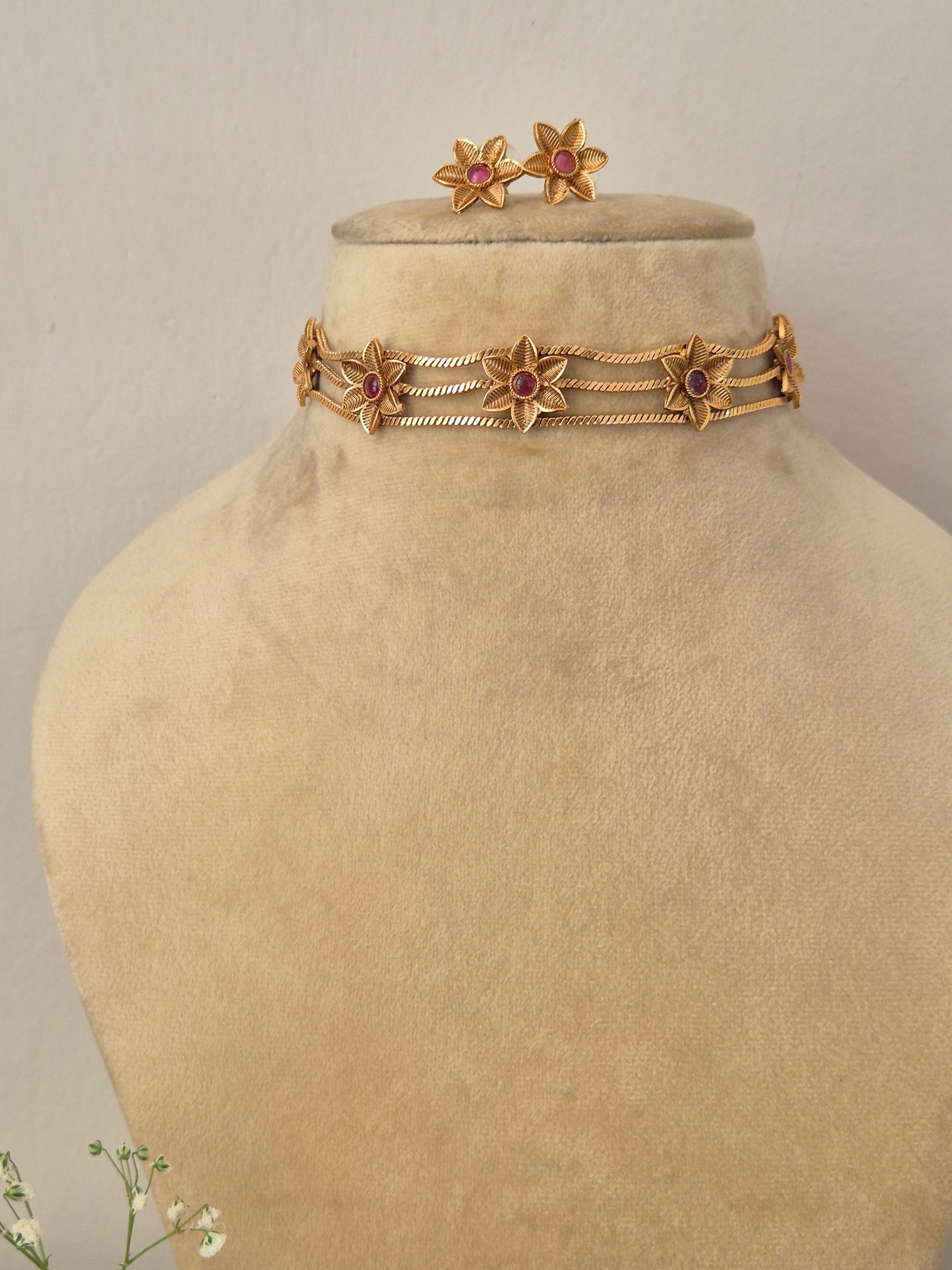 Elegant pink-red gemstone and gold-toned ethnic choker jewelry set, by naitri.in