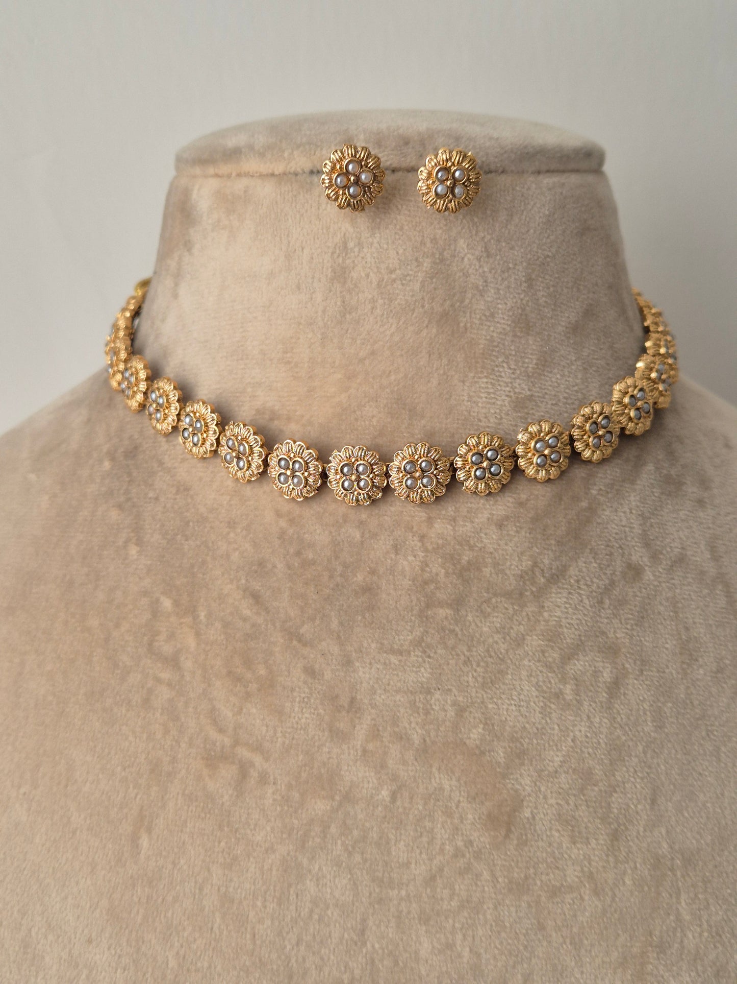 simply crafted golden necklace with matching earrings cute and simple design can be wear everywhere by naitri.in
