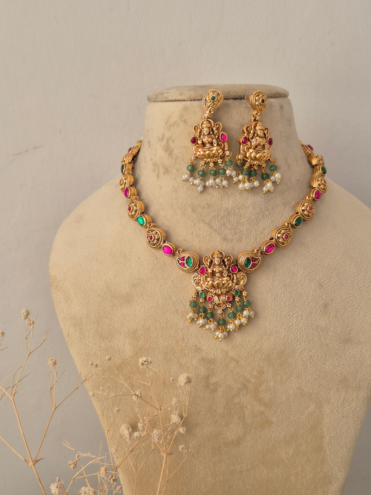 Handcrafted brass alloy traditional Indian necklace set with intricate temple motifs by Naitri.in