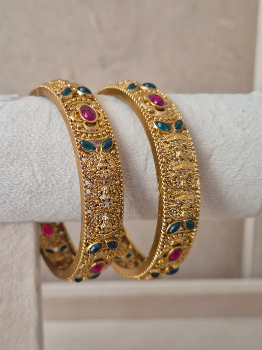 Dhanashree Bangles set of 2, traditional Indian gold-plated bangles with red and green stones, ethnic festive and bridal jewelry collection by Naitri.in