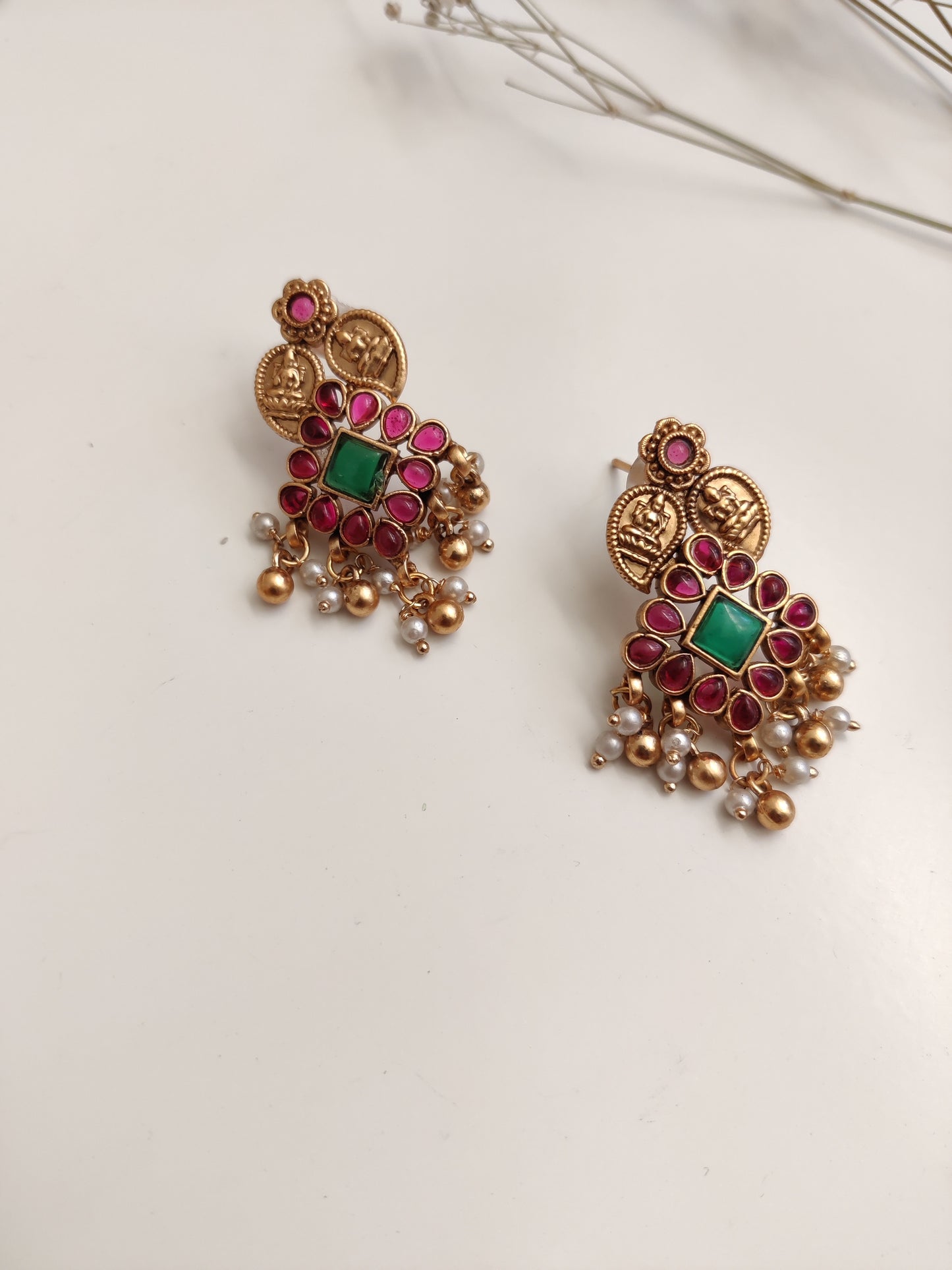 Majestic gold-tone temple necklace set in metal alloy featured to highlight intricate design and shine