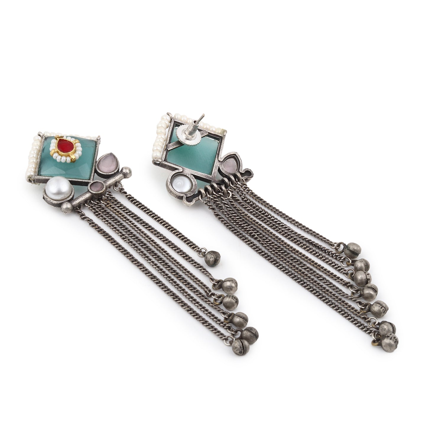 Green and blue stud earrings, Isharya by Naitri on plain display card.