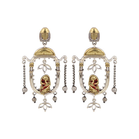 Red and gold stud earrings with bold stone embellishments